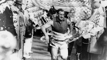 Footscrayâs captain Charlie Sutton leads the team out.
