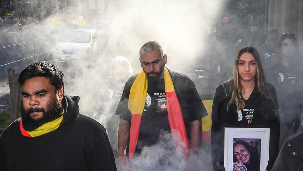 Tanya Day's family and supporters take part in a smoking ceremony ahead of the inquest.