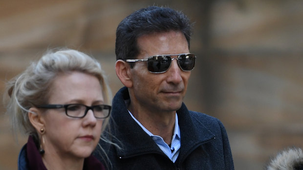 Universal Medicine founder Serge Benhayon, right, outside the NSW Supreme Court on Tuesday.