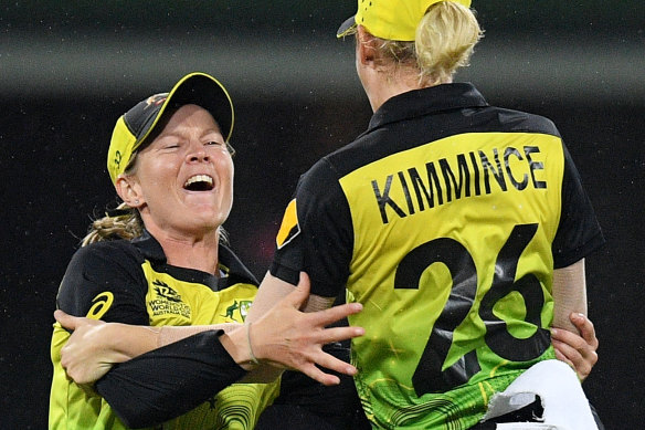 Australian captain Meg Lanning and Delissa Kimmince celebrate their semi-final win at the SCG. 