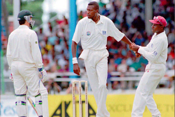 Richie Richardson holds Curtly Ambrose back from Steve Waugh in 1995.