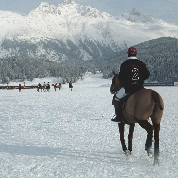 A polo player at the world renowned snow polo tournament on Lake St Moritz, Switzerland.