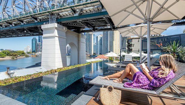 There’s a direct correlation between hotel rooftop pools and the activation of holiday-mode.