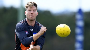 Toby Greene is facing legal action over a drunken attack on a bouncer.