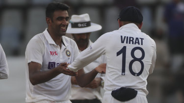 Ravi Ashwin shares a lighter moment with Virat Kohli as India destroyed New Zealand in the second Test in Mumbai.