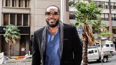 Chris Gayle arrives at the NSW Supreme Court in Sydney on Monday, October 23, 2017. 