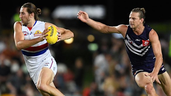 Leading lights: Bulldog Marcus Bontempelli breaks past Fremantle's Nat Fyfe.