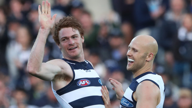 Top Cats: Gary Ablett congratulates Gary Rohan for another goal against West Coast.