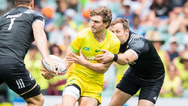 Australian seven's captain Lewis Holland in action against New Zealand. 