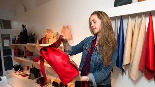 A customer in Mon Purse Boutique in Paddington. The company entered administration in December.