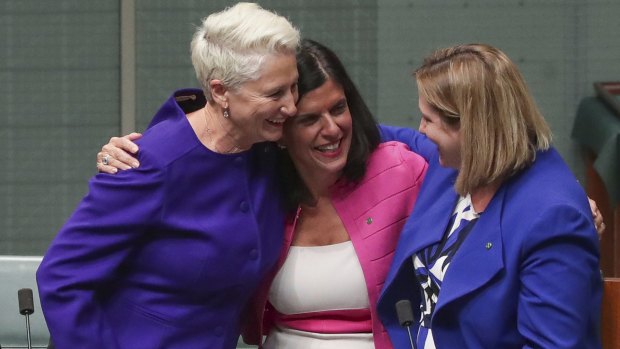 Crossbench MPs Kerryn Phelps, Julia Banks and Rebekha Sharkie celebrate after the Medevac Bill passes the House of Representatives.