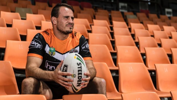 Josh Reynolds will be watching the Tigers' opening NRL clash from the stands.