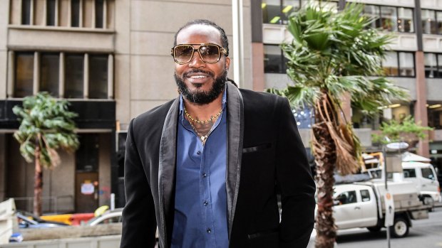 Chris Gayle arrives at the NSW Supreme Court in Sydney on Monday, October 23, 2017. 