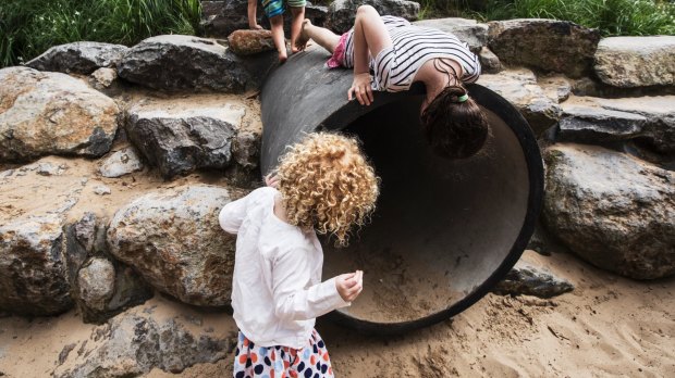 Kids play in the Ian Potter Children's Wild Play Garden in Centennial Park, Sydney.