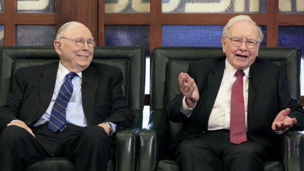 Berkshire Hathaway chairman and CEO Warren Buffett, right, alongside vice chairman Charlie Munger.