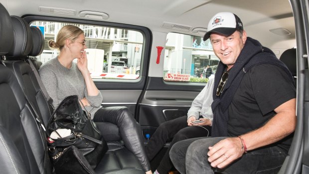 Karl Stefanovic and Jasmine Yarbrough at Sydney Airport after their lavish wedding in Mexico in December.