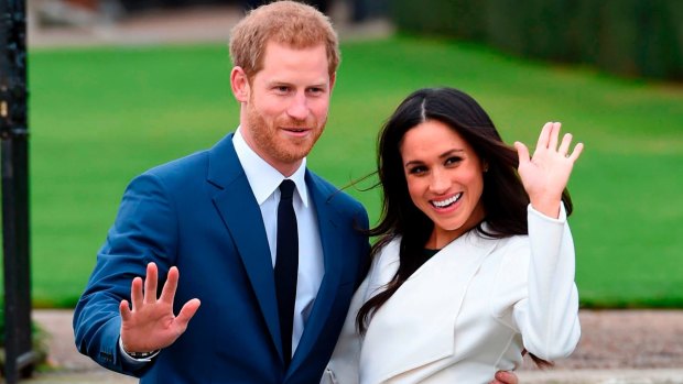 Prince Harry and Meghan Markle pose for the media after their engagement.