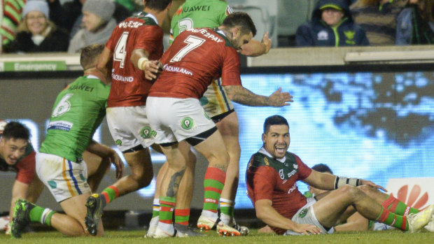 Blues contender: Cody Walker scores out wide for the Rabbitohs.
