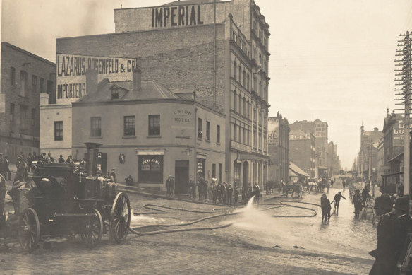 Cleansing the streets in 1900.