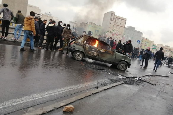 Iran's supreme leader backed the government's decision to raise gasoline prices and called angry protesters who have been setting fire to public property over the hike "thugs." 