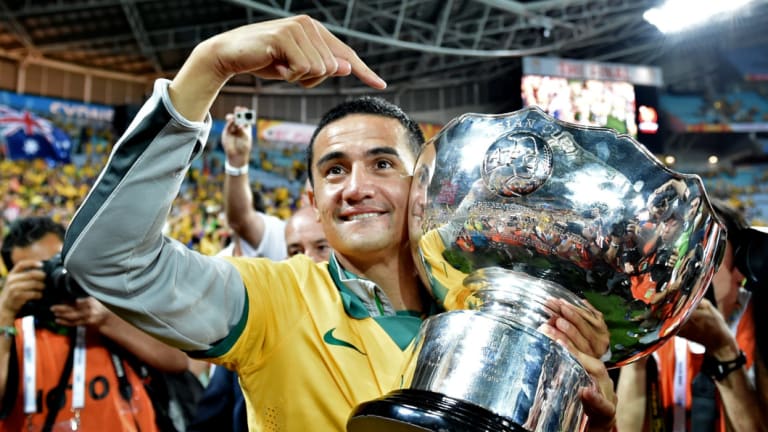 Tim Cahill with the trophy after Australia's 2015 Asian Cup success.