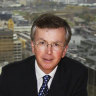 Minter Ellison lawyer Peter Bartlett with a copy of The Age from 1980 when the paper pulled a story about the Anzus Papers for legal reasons and replaced it with an advertisement.