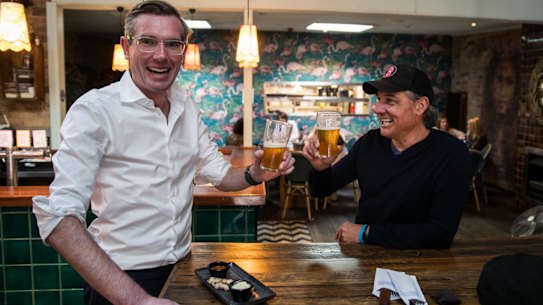 NSW Treasurer Dominic Perrottet. having a beer with the owner Justin Small at The Balmain. Pubs,cafes and restaurants have reopened with a limit of 10 people. Coronavirus. 15th May 2020. Photo: Edwina Pickles / SMH