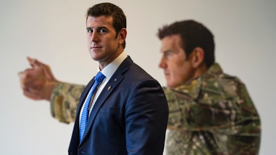 Ben Roberts-Smith in front of his portrait at the Australian War Memorial in Canberra. 