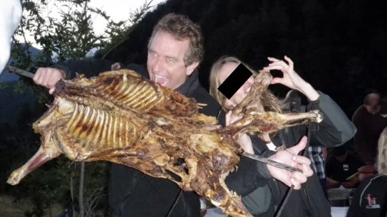 Robert F Kennedy Jr poses with an animal carcass.