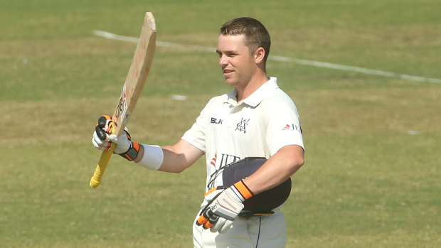 In the runs: Marcus Harris after bringing up three figures.