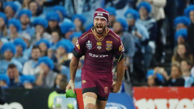 No luck here: Johnathan Thurston knocks over the game-winning kick in Origin II last year to keep the Maroons and the series alive.
