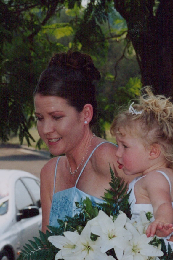 Emma Bates as a bridesmaid, pictured with her niece.