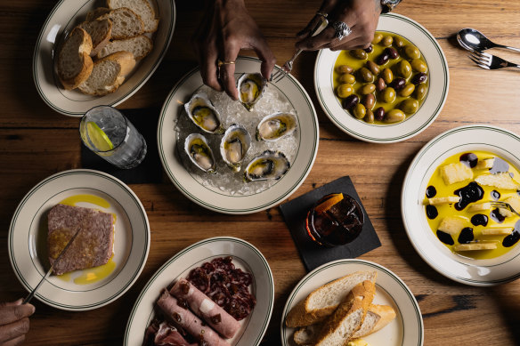 Snacks at Dutch Rules include terrine, charcuterie, oysters and parmigiano reggiano.