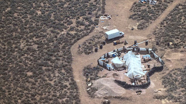 An aerial photo released by Taos County Sheriff's Office shows a rural compound during an unsuccessful search for a missing three-year-old boy in New Mexico.