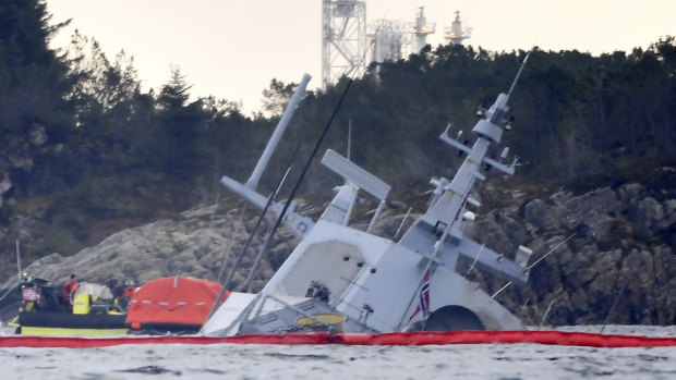 The Norwegian frigate "KNM Helge Ingstad" partially submerged in the sea near Bergen, western Norway, last month.