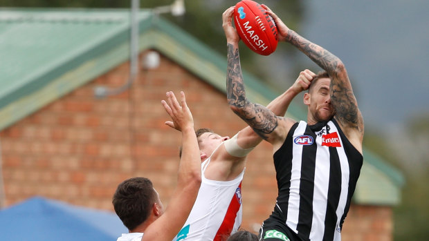 High flier: Magpie Jeremy Howe takes a trademark screamer yesterday at Morwell. 