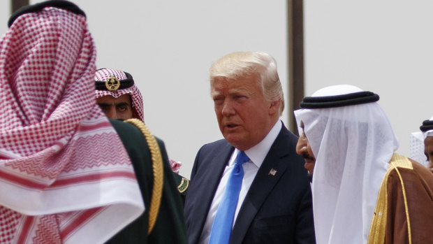 Donald Trump walks with Saudi King Salman, right, during a welcome ceremony in Riyadh. Saudi Arabia was Trump's first overseas destination after becoming president.