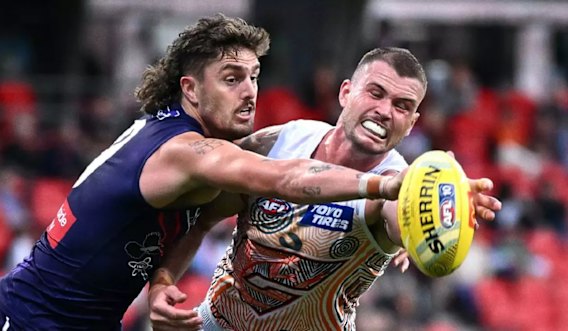 Luke Jackson (left) contests for the ball with Kieren Briggs at ENGIE Stadium. 