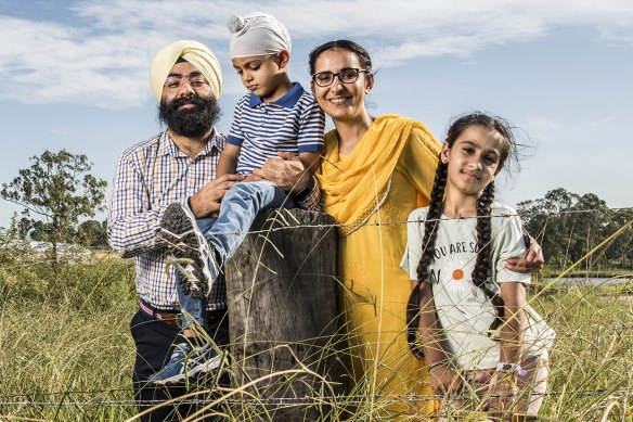 Kanwar Jeet (far left), one of the volunteers behind the establishment of Australia’s first Sikh school, with his family.