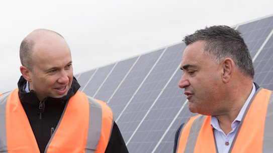 NSW Energy and Environment Minister Matt Kean (left) with John Barilaro, the Deputy Premier and Nationals leader, during a visit in August 2020 to a solar farm near Dubbo.