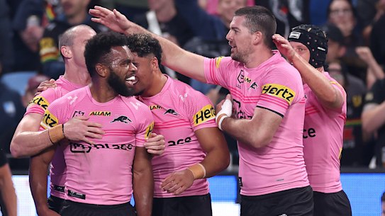 Happy cats: Penrith prevail for a ninth win straight win over the Roosters.