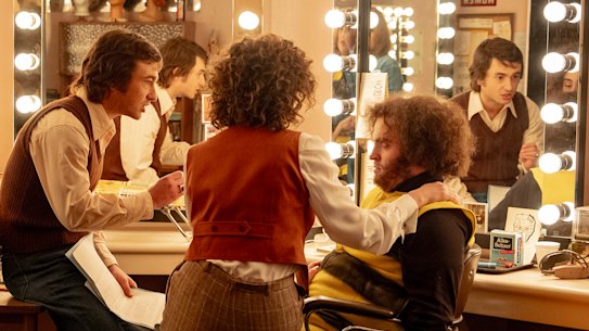 This image released by Sony Pictures shows, from left, Kim Matula, as Jane Curtin, Emily Fairn, as Laraine Newman, Gabriel La Belle, as Lorne Michaels, Rachel Sennott, as Rosie Shuster, and Matt Wood, as John Belushi in a scene from “Saturday Night.”  (Hopper Stone/Sony Pictures via AP)