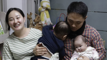 A South Korean woman Seo Hyo Sun, left, speaks during an interview at her home in Buchon, South Korea. Every baby born in South Korea last year considered to be 2 on January 1. 