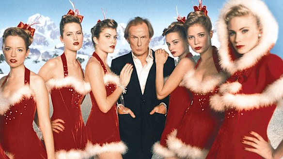 Bill Nighy as Billy Mack and friends in Love Actually.