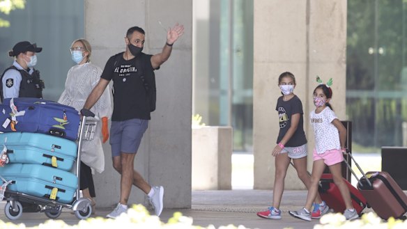 Australians stranded overseas because of COVID-19 arrive on a repatriation flight from Singapore at Canberra Airport, where they boarded a bus to go to hotel to quarantine. 