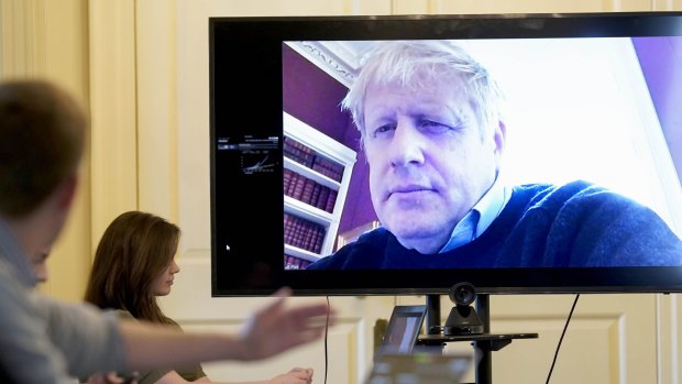 British Prime Minister Boris Johnson chairs a meeting remotely from self isolation after testing positive for coronavirus.