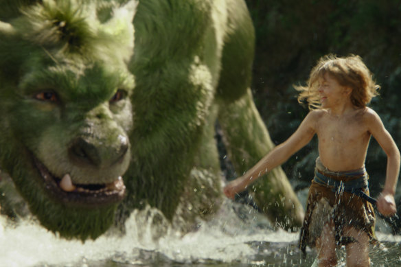 Oakes Fegley and the creature in Pete’s Dragon, Lowery’s 2016 enviro-family film for Disney.