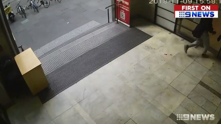 The last image of the CCTV footage is Shire Ali chasing the security guard into a room. 