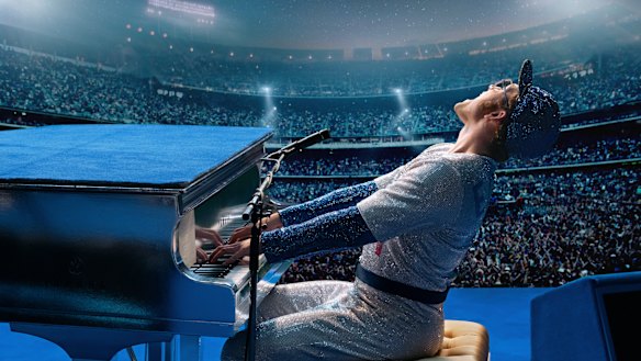 Taron Egerton as Elton John in a scene from Rocketman.