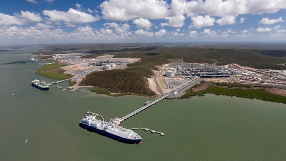 An aerial view of three LNG projects on Curtis Island all with ships at their jetties, with Australia Pacific LNG in the background (file image). 